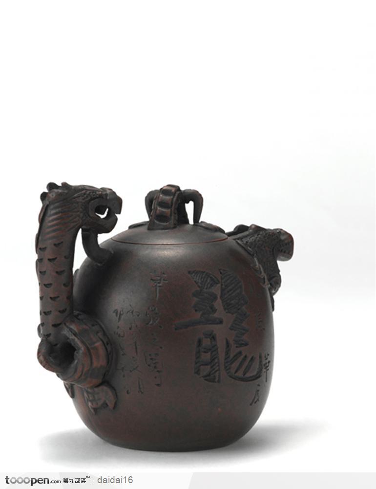 中华传统工艺品-刻着龙字的紫砂壶