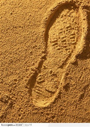 沙子背景-沙子上的脚印