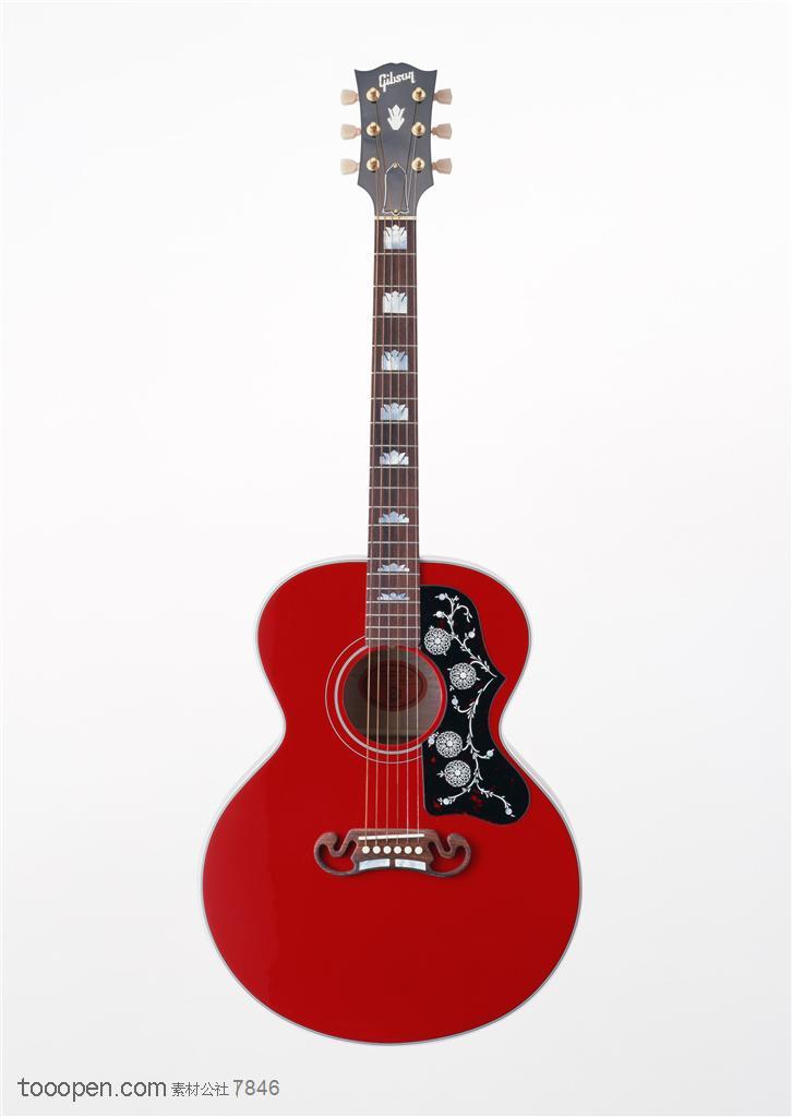 乐器吉他-竖着摆放的红色吉他