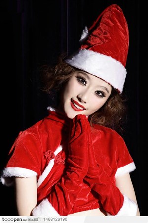 穿圣诞衣戴圣诞帽的大眼红唇美女张如
