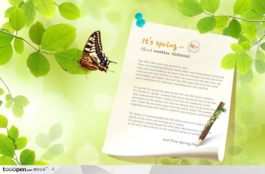 放在卷起的纸上的铅笔和停在绿色叶子上的蝴蝶