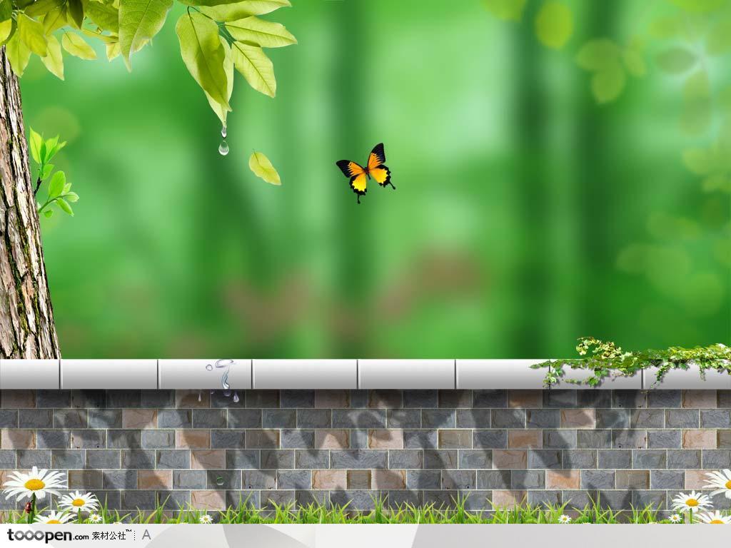 草地围墙外模糊的绿色树林和飞舞的蝴蝶