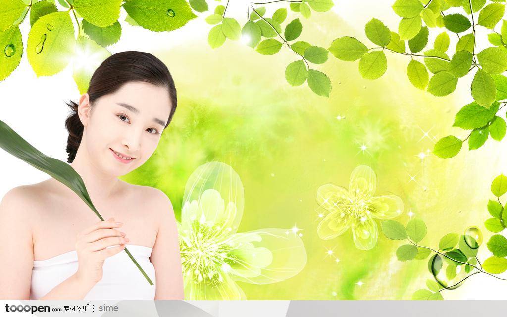 美容SPA健身保健-绿色花卉梦幻背景拿着叶子的美女