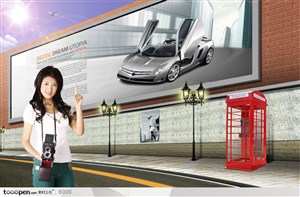 汽车广告素材-围墙上的跑车广告和路边的摄影美女