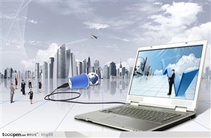打开的白色笔记本电脑和城市建筑背景