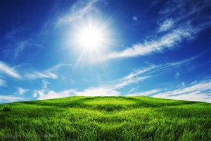 平原草原-蓝天下的绿色山坡