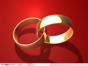 情人节婚庆元素 扣在一起的金色戒子