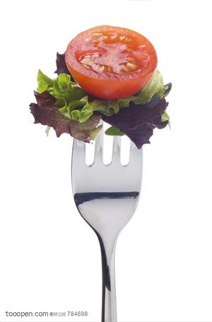 水果拼盘-叉子叉子上的西红柿和生菜
