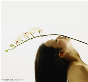 美容保健-美女头上的花枝
