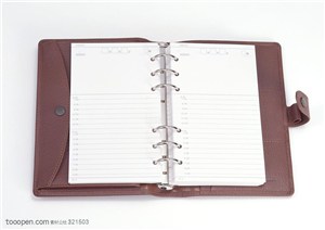本子-打开的一本棕色封面笔记本