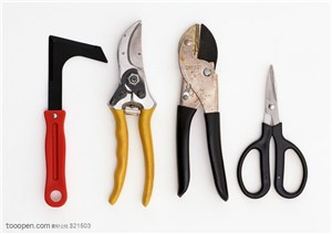 劳动工具-竖着摆放在一起的各类剪刀特写