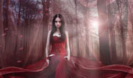 树林里坐在地子上红衣的美女