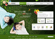 绿色系网页-草坪上的儿童环保低碳网站