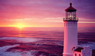 海边夕阳霞光下的航海航灯灯塔图